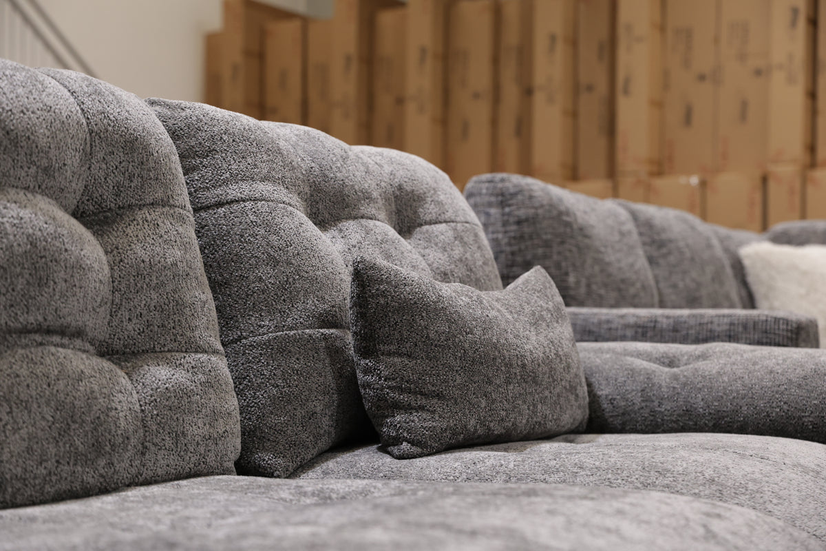 Premium dark grey electric sliding couch with supportive seating, soft upholstery and generous legroom