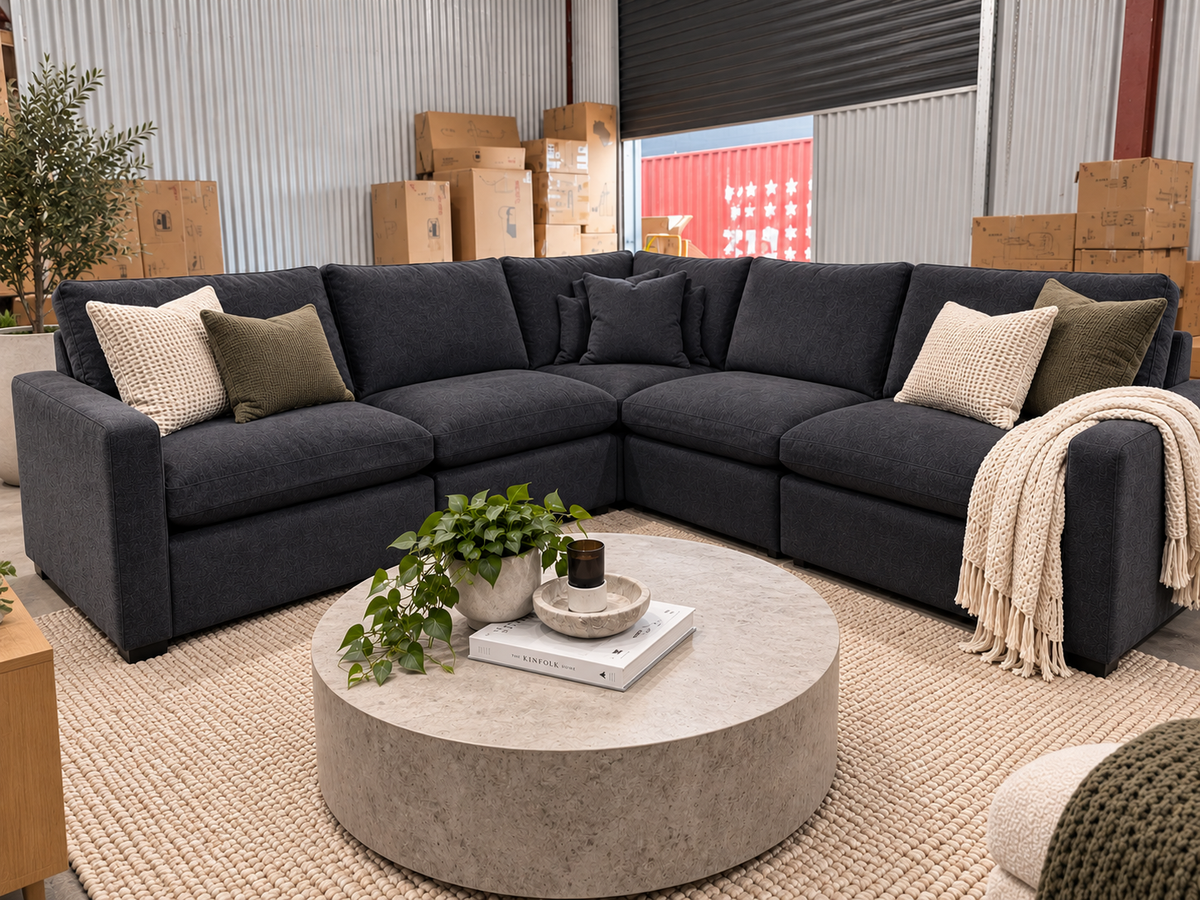 Modular electric recliner sofa in charcoal fabric with adjustable reclining footrests