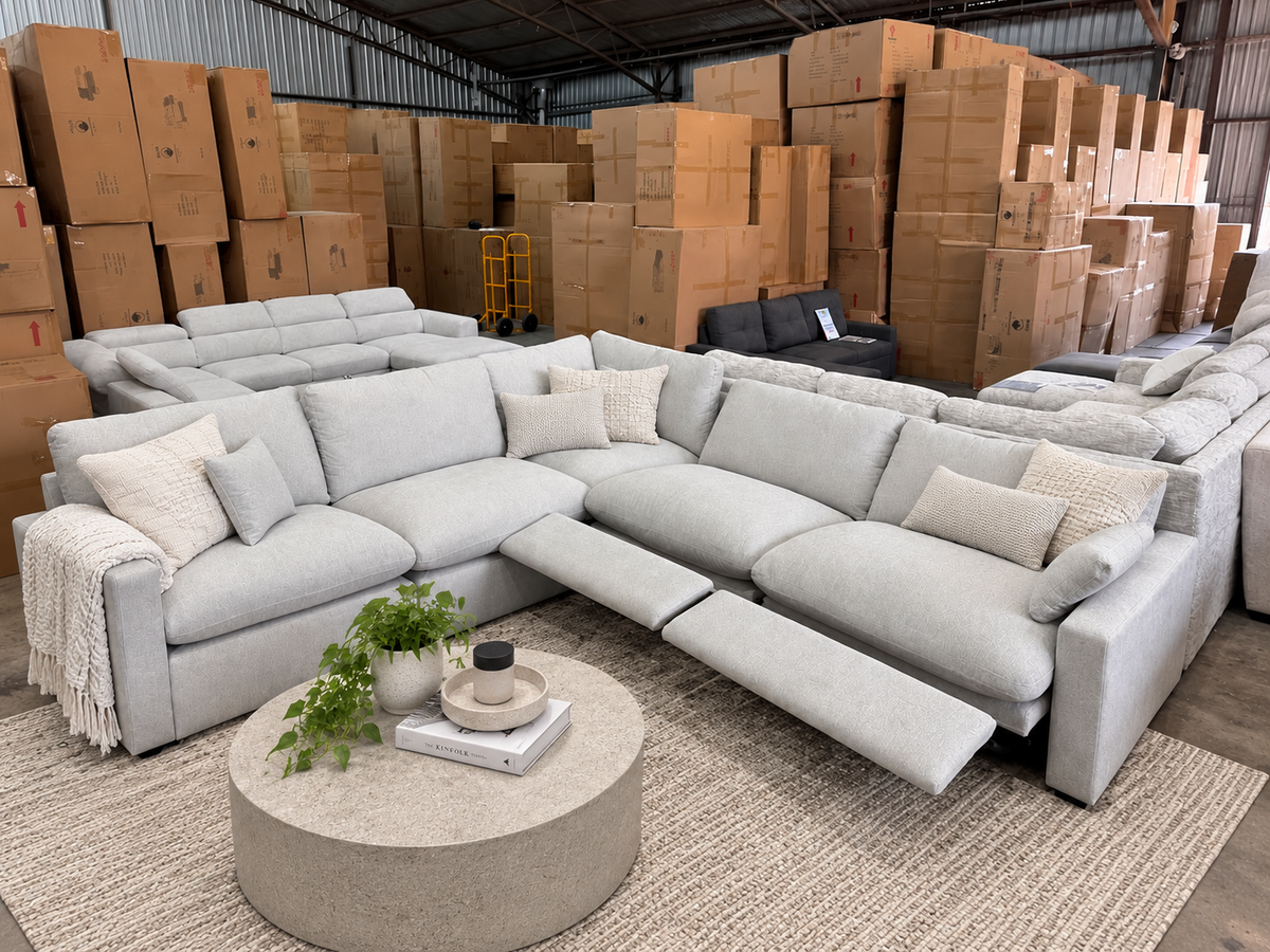 Light grey recliner modular corner lounge with plush cushions and spacious L-shaped seating