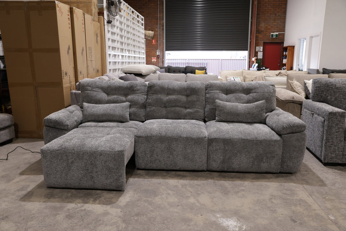 Three seater fabric lounge with electric slide-out seating, deep cushions and contemporary design