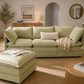 comfortable soft green couch with supportive cushioned back