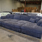 double chaise couch with ottoman inserted between