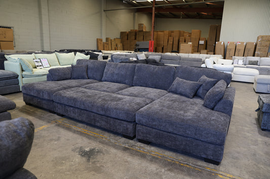 double chaise couch with ottoman inserted between