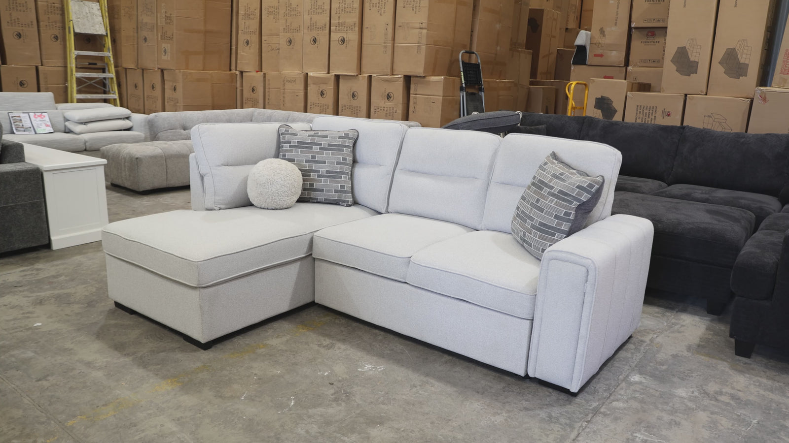 video of compact couch with sofa bed and storage